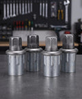 Four Adjustable Stainless Steel Furniture Feet With Levelers For Desks Cabinets Chairs And Shelving Units Bullet Leg Caps Built For Long Haul Floor Protection For Stable Even Surfaces., set of 4 stainless steel adjustable feet on workbench