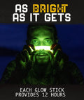 Person in dark holding Ultra Bright Green Glow Sticks Bulk Pack For Parties Camping Emergencies And Survival Kits Visible