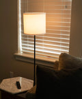 Two Pack 20W Halogen Appliance Light Bulbs That Replace GE Microwave Lights lighting up a cozy living room corner