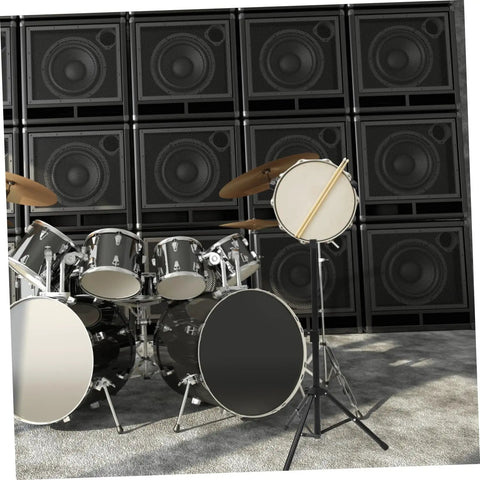 Solid Height Adjustable Snare Drum Stand Portable Alloy Tripod Practice Rack with drums and speakers in background.
