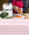 Person using Stainless Steel Countertop Compost Bin 1.3 Gallons Odorless No Stink With Carbon Filter Airtight Lid Indoor Kitchen Companion