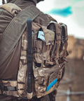 Ultimate Tactical Backpack With Zip On Back Panel For V5 Vest Compatible MC, Built From 500D Nylon, worn outdoors.
