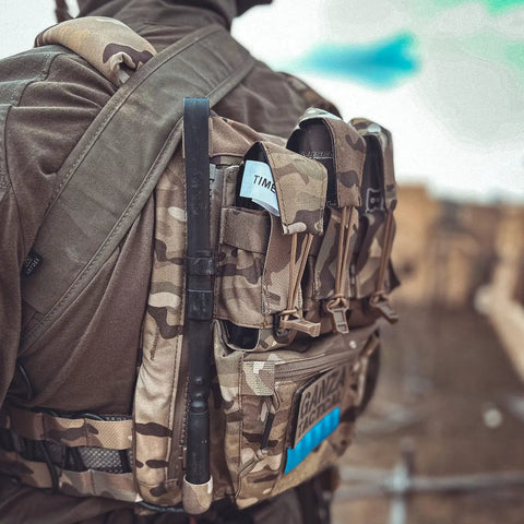 Ultimate Tactical Backpack With Zip On Back Panel For V5 Vest Compatible MC, Built From 500D Nylon, worn outdoors.