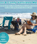 Woman relaxing on beach with 2 Pack Lightweight Low Beach Chairs With Breathable Mesh Back, Folding Portable Sand Chairs With Cup Holder, Ultralight 6 Lb Each, Heavy Duty 300 Lb Capacity, Easy Carry For Camping And Outdoor Use, Blue
