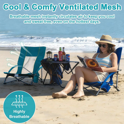 Woman relaxing on beach with 2 Pack Lightweight Low Beach Chairs With Breathable Mesh Back, Folding Portable Sand Chairs With Cup Holder, Ultralight 6 Lb Each, Heavy Duty 300 Lb Capacity, Easy Carry For Camping And Outdoor Use, Blue