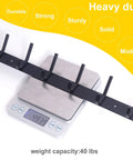 Heavy Duty Wall Mounted Coat Rack With Six Double Hooks Sturdy Metal Rail For Coats Purses Jackets And Backpacks Entryway Organizer In Black 17.1 Inch Long displayed on scale
