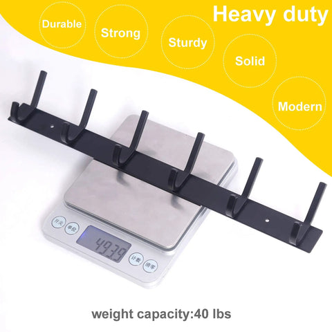 Heavy Duty Wall Mounted Coat Rack With Six Double Hooks Sturdy Metal Rail For Coats Purses Jackets And Backpacks Entryway Organizer In Black 17.1 Inch Long displayed on scale