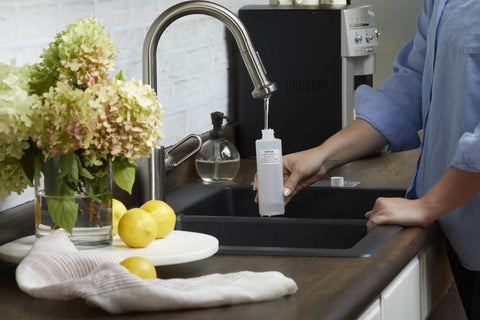 Convenient OMNIFilter Mail Home Water Test Kit Sends Samples To Pro Labs For Dope Results Without Guesswork So You Can Finally Hit Top Shelf Drinking Water Quality Daily being filled with tap water.