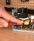 Using the Quarter Inch Drive Anodized Stainless Steel Ratchet With 72 Tooth Gear on an electrical device in a workshop