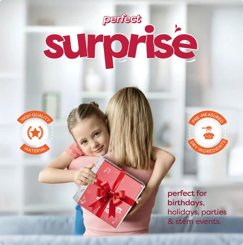 Child hugging woman holding a red gift box labeled "surprise," suitable for Whimsical Hot Air Balloon Madeleines Kids Baking Kit With Pre Measured Ingredients Silicone Mold Colorful Batter And Icing Decorations Stem Learning Activity Educational Recipe Book For Fun Family Baking For The Fam.