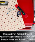 Double-sided heavy-duty mounting strips and tape for walls and outdoor use, shown with tools on a red workbench, pack of 8 strips
