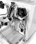 Next Level Home Bar Essentials Italian Handcrafted Espresso Machine With Heat Exchanger And E61 Manual Controls Badass Stainless Steel Chassis close-up view of control knobs and portafilter.