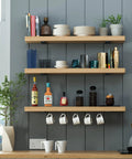Six Pack 6 Inch Floating Shelf Brackets Built Tough Heavy Duty Hidden L Brackets supporting wooden shelves with kitchenware