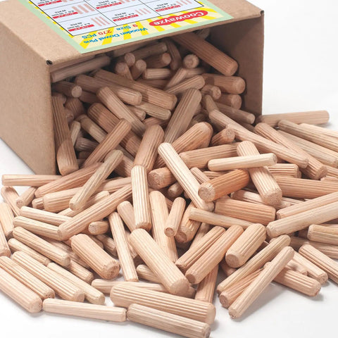 Pro Grade Top Shelf Fluted Hardwood Dowel Pin Multi Pack For Woodworking Craft Assembly And Diy Projects Hella Smooth Kiln Dried Finish With Straight Up Tight Grip, assorted sizes in a cardboard box.