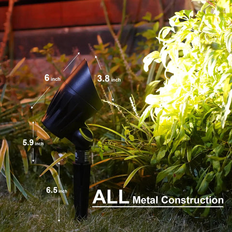 8 Pack 50W Low Voltage Backyard Landscape Spotlight Kit with 3000K warm white flood lights illuminating plants at night.