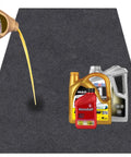 Heavy Duty Garage Floor Mat 36x60 Inches absorbs oil and liquids with waterproof backing, shown absorbing oil spill with bottles on top