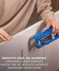 Person using Adjustable Door Hinge Routing Jig With Depth Guide For Precise Mortises And Accurate Latch Routing on door edge.