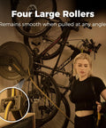 Heavy Duty Double Arm Retractable Air Hose Reel 50 Foot Reach Half Inch Steel Hybrid Core in garage with large rollers.