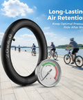 Beefy Heavy Duty Fat Bike Inner Tube 20x4.0 with Schrader Valve shown with cyclists by a river.