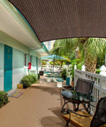 Brown 5x7 Sun Shade Sail Rectangular UV Blocking Outdoor Canopy installed over patio area in garden with HDPE material