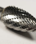 Close-up of Half Inch SG-5 Pointed Tree Bur Double Cut Solid Carbide Rotary Tool Bit showing intricate cutting edges.
