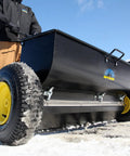 Spyker P70-12010 Commercial Drop Spreader With 120 Lb Hopper, 36 Inch Spread Width, Powder Coated Steel Frame on icy terrain