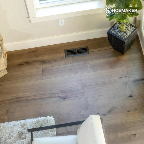 Living room floor with Heavy Duty Boss Grade 4x12 Floor Register Storm Gray Metal Vent Cover for Home Floors with quiet operation.