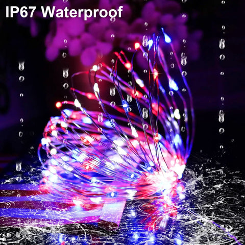 Patriotic Solar Fairy String Lights 2 Pack With 200 LED 66 Ft Red White Blue Outdoor Waterproof shown in rainy setting