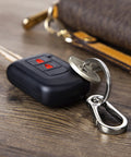 4 Piece Multipurpose Keychain Clip Set With Secure Zinc Carabiner And Steel Keyring on table near car key and wallet