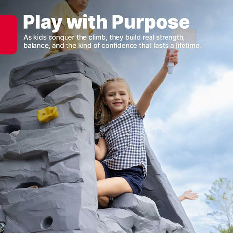 Child climbing Skyward Summit Climbing Wall Playset For Kids Ages Four To Eight, 6.5 Ft Four Sided Rock Wall, smiling