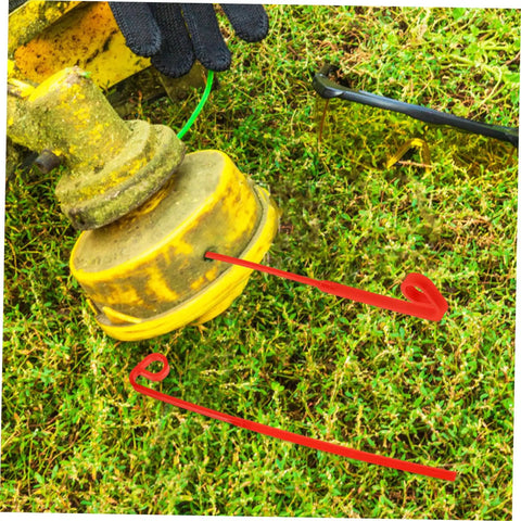 20 Pack Durable Plastic Grass Mower Blades Replacement for Lawn Care and Garden Jobs attached to yellow mower