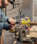 Killer One Inch Tenon Cutter With Beefy Twin Blades And Built In Scale Fits Half Inch Drills And Up in use on wood log.