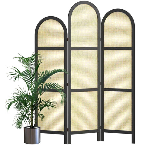 Three Panel Hand Woven Rattan Room Divider With Built Tough Pine Wood Frame No Assembly Needed Tall Foldable Privacy Screen in Black Wave next to a plant