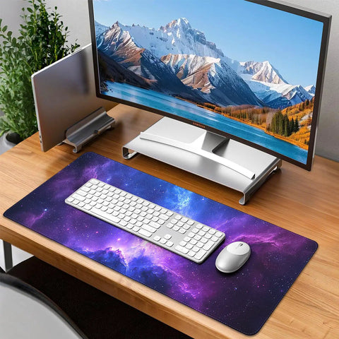 Galaxy Space XXL Gaming Mouse Pad 31.5 x 11.8 Inch Large Desk Mat with Smooth Surface Non Slip Rubber Base Stitched Edges under keyboard and mouse on desk.