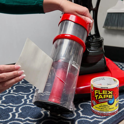 Person applying Thick Rubberized Waterproof Tape That Seals Leaks, Patches Cracks, And Repairs Like A Pro, Even Underwater to vacuum