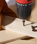 Job Site Ready Wood Screw Assortment Kit, 152 Pieces Bronze Galvanized Flat Head Phillips Drives installed into wood.