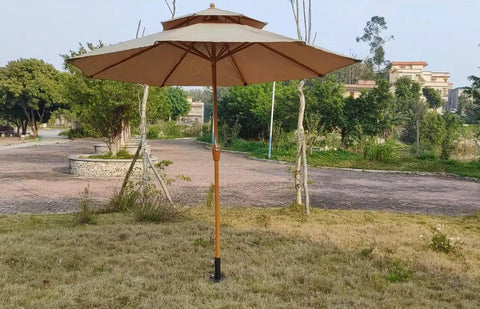 Heavy Duty Patio Umbrella Stand For 1.2 To 2.2 Inch Poles With Ground Spike Easy Carry Table Base in garden setting