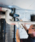 Professional Grade Cordless Saber Saw Delivering Smooth Operator Performance And Badass Cutting Power For Heavy Duty Renovations And Real Deal Work On Any Job Site cutting through pipes.