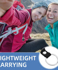 Two hikers with Mini Zinc Alloy Compass Keychain Set For Outdoor Adventures attached to backpack during a hike