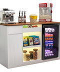 Snack Bar Cabinet With Fridge Space And Candy Display Shelf, All In One Coffee Station For Home Theater Or Game Room, White 51.2 Inch Long Storage Organizer For Chips Cookies And Candy, featuring a coffee machine and popcorn maker.