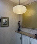 Large White Chinese Paper Ceiling Lamp Shade And Oval Pendant Light Cover With Vintage Round Chandelier Lantern Design in cozy interior