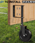 Heavy Duty 5 Inch Spring Loaded Gate Caster Wheel Packs Rock Solid Shock Absorption And Smooth 360 Swivel Glide For Outdoor Wooden Fence And Steel Tube Gates No Stress Rolling Up To 220 Pound In Matte Black mounted on a wooden fence.