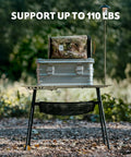 Grab And Go Tactical Camping Table With Adjustable Height From 14 To 23 Inches supporting cargo, in forest setting