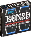 Soft Hardcore Skateboard Bushings Black For Ultra Smooth Turns And Responsive Control Urethane Made In USA Designed By Pro Skaters For Street And Park Truck Setups packaging with blue bushings.