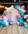 Doggo Approved Paw Print Party Balloon Kit With Pink Teal Purple Hot Pink Paw Print Balloons And Bone Foil Balloon For Girls Puppy Themed Birthday Or Baby Shower Decor displayed in an arch