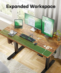 Marsail 48 X 30 Electric Standing Desk With One Piece Thickened Desktop, Height Adjustable Sit Stand Workstation Featuring Robust Cable Management System For Effortless Home Office Ergonomic Setup And Easy Assembly in an expanded workspace.