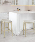24-Inch Counter Height Saddle Stool 2-Pack With Nailhead Trim Thick Padded Beige Fabric Seats Antique White Base in kitchen