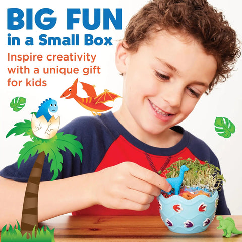 Child assembling Mini Garden Dinosaur Terrarium Kit For Kids A Fun Dinosaur Craft Toy And Science Kit For Boys Ages Six And Up Grow Your Own Dino Egg Terrarium With Quick Grow Seeds And Jurassic Decor in small ceramic pot.