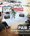 Living room with TV and skiers on screen, two Beast Bluetooth Speaker for Outdoors 100W Peak Power IPX6 Waterproof Boomboxes on floor