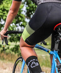 Cyclist on bike with Suspension Seatpost For Road, Gravel And E-Bikes With XR Lightweight Aluminum Build, Easy Fit, 31.6mm Diameter.